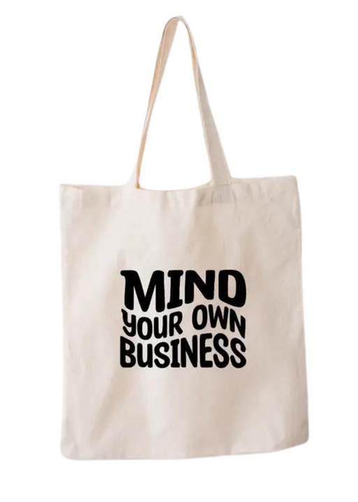 a tote bag with mind your own business on it