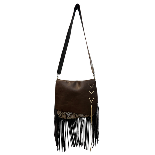 a brown purse with fringes hanging from it