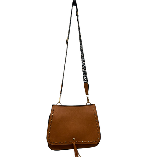 a brown handbag with a tasselled strap