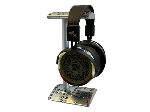 a pair of headphones sitting on top of a stand