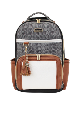 a gray and white backpack with a tassel