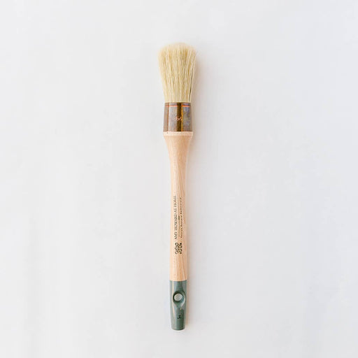 a paint brush on a white background