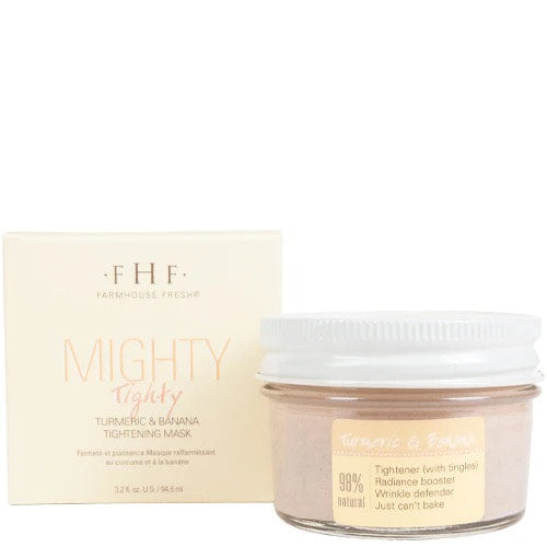 a jar of makeup mighty tighty next to a box