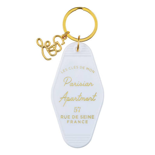 a keychain with the words paris apartment on it