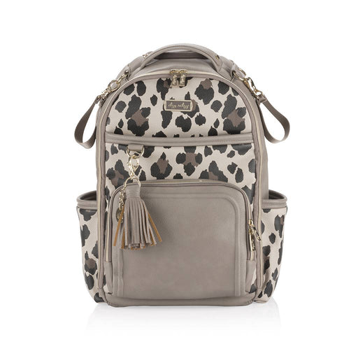 a leopard print and khaki colored diaper bag with tassel on zipper
