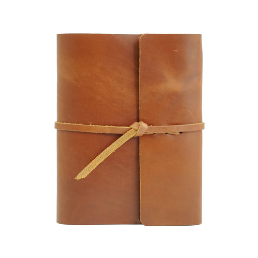 a brown leather journal with a brown ribbon