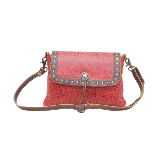 a red and brown purse with a silver buckle