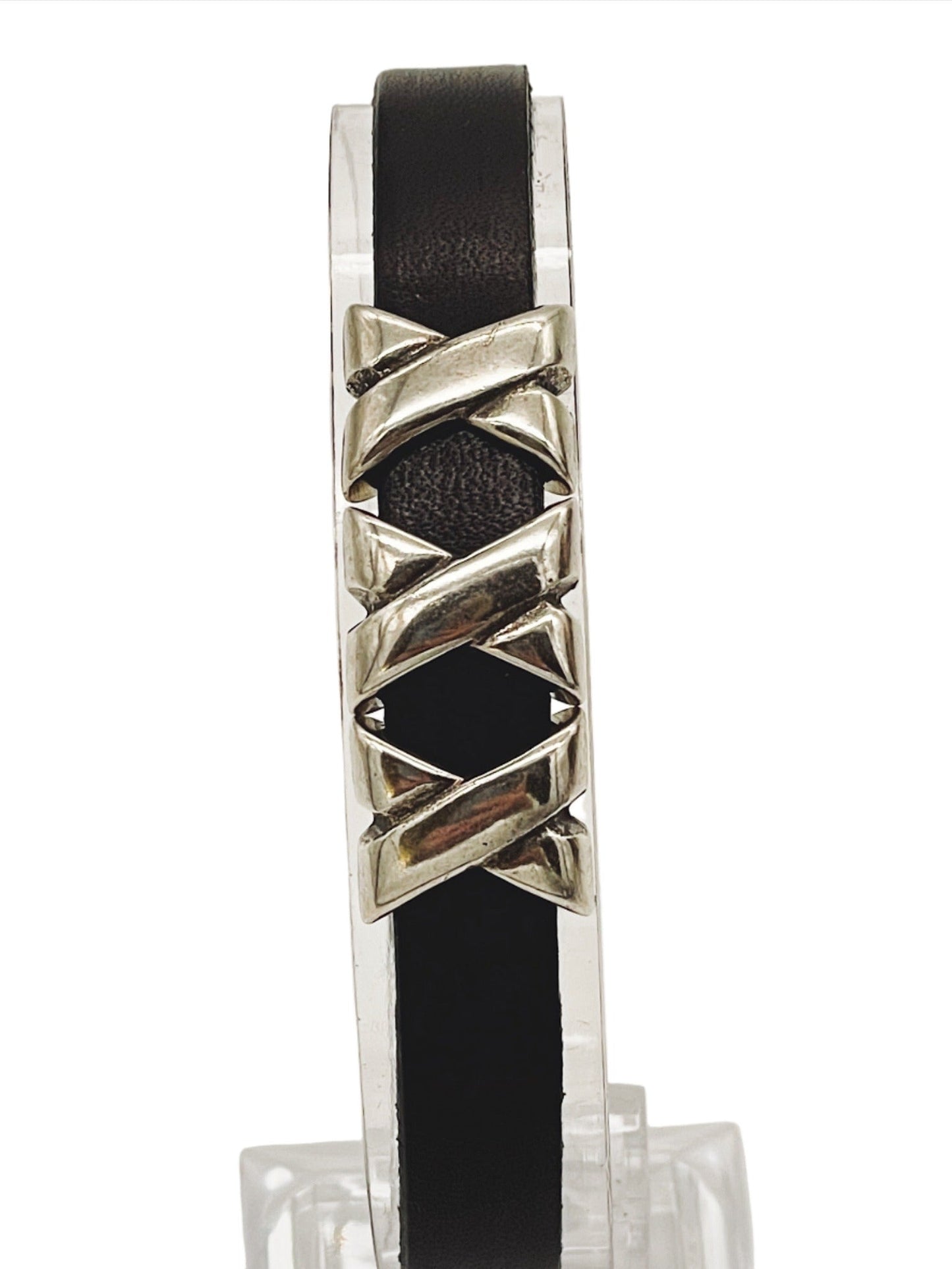 a black leather bracelet with silver accents