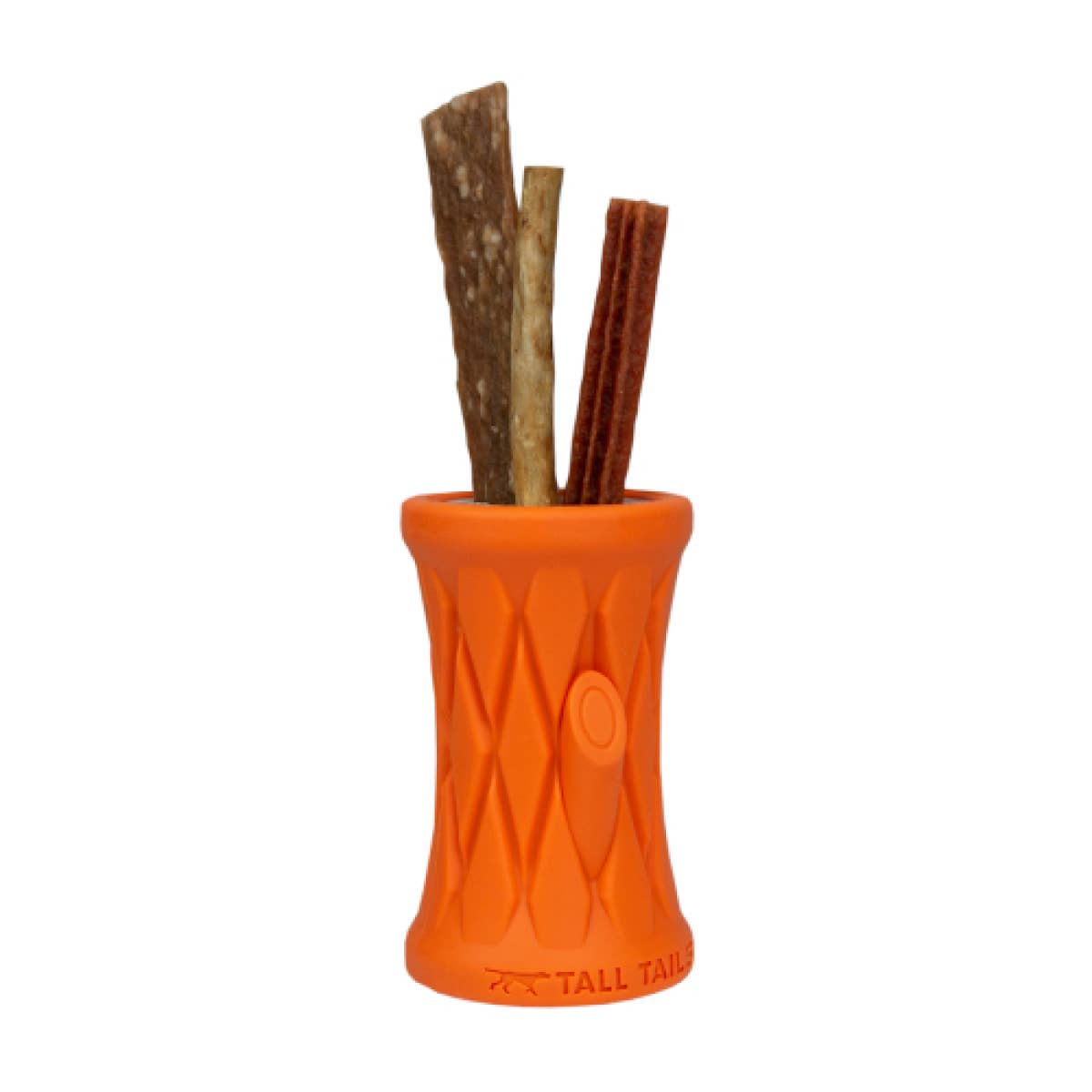 a small orange cup with sticks sticking out of it