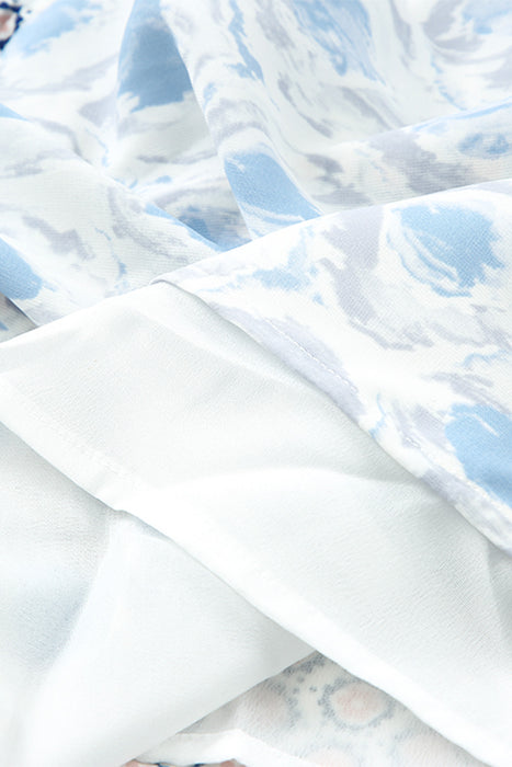 a close up of a white and blue blanket