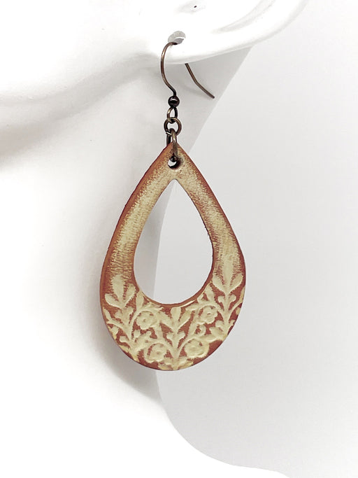 antique ivory leather stamped earring