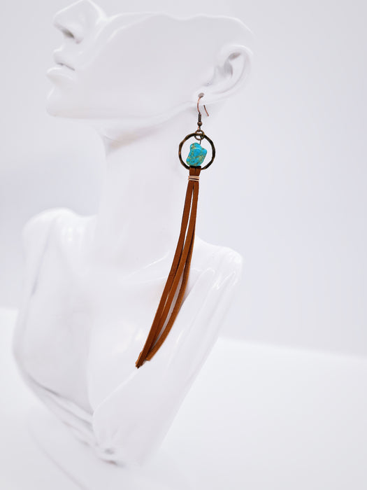 Turquoise Drop Earring with Suede Tassel on mannequin display