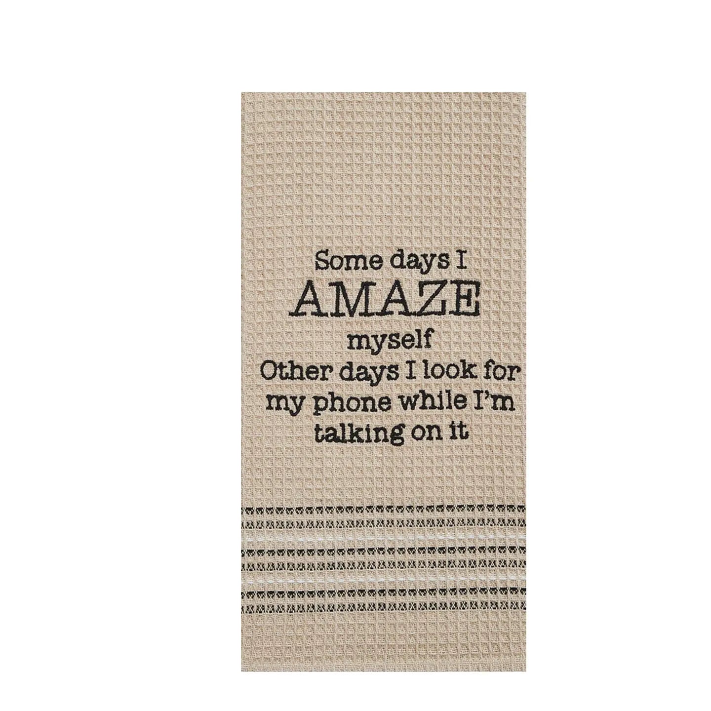 a taupe towel that says Some days I amaze myself Other days I look for my phone while I'm talking on it