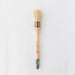 a paint brush on a white background