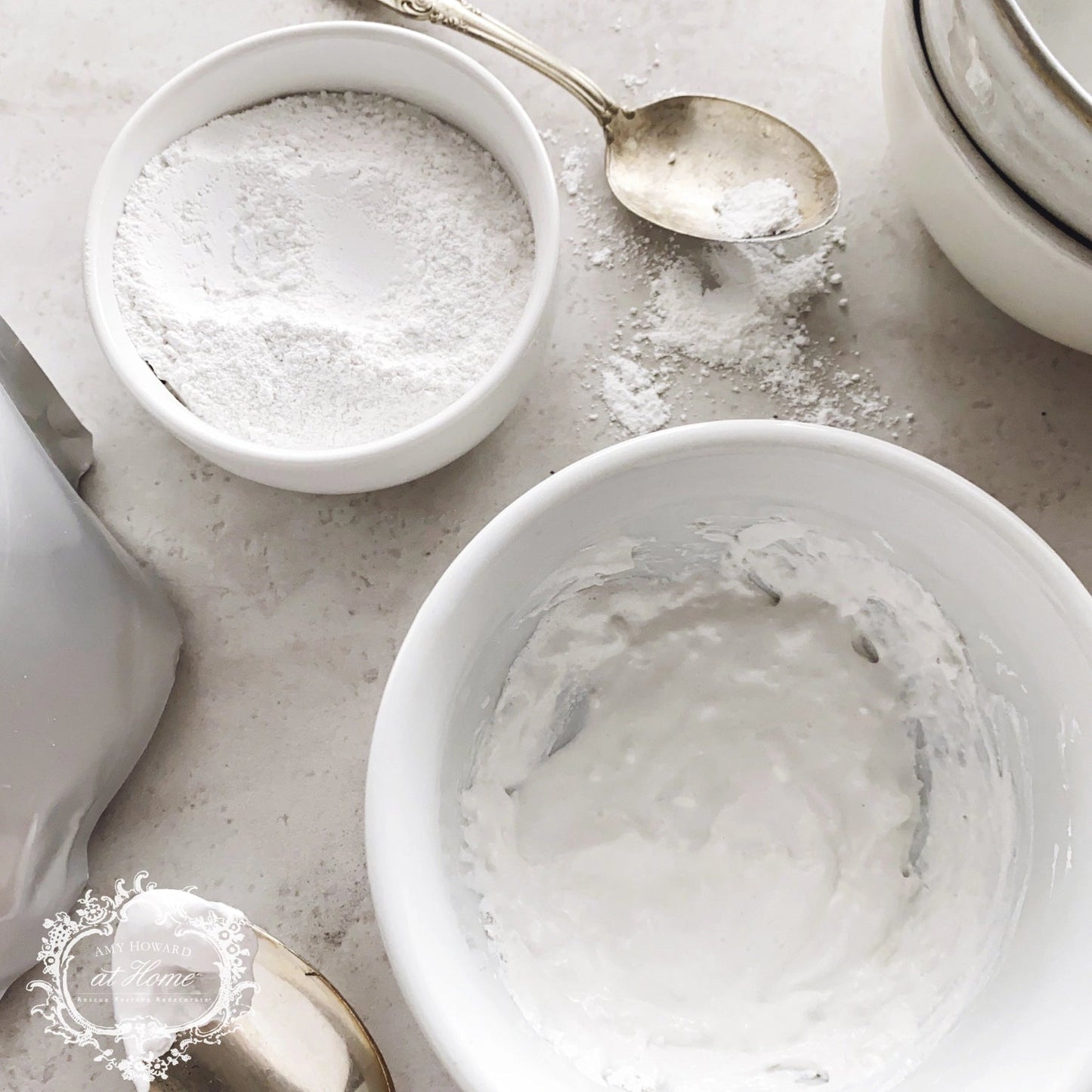 a bowl of venetian plaster next to a spoon