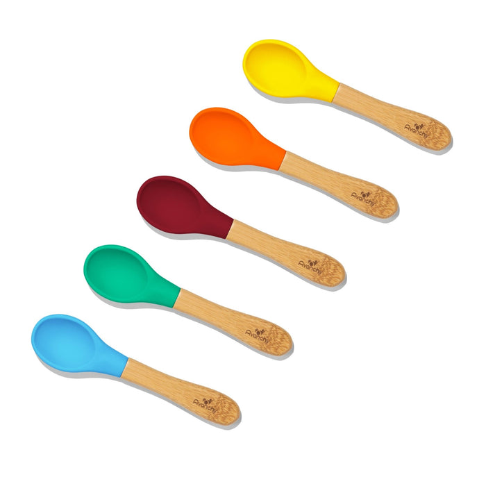 a set of four wooden Soft on Gums Baby Spoons in different colors