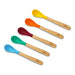 a set of four wooden spoons with silicone in blue, green, burgundy, orange and yellow