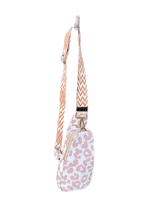 a pink and white bag with a leopard print pattern