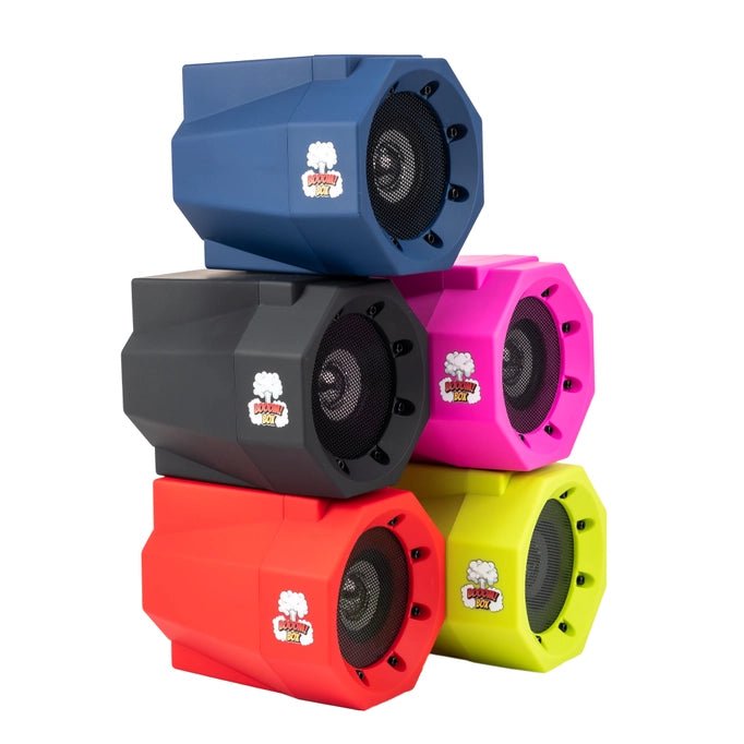 a group of colorful compact boom box speakers sitting on top of each other