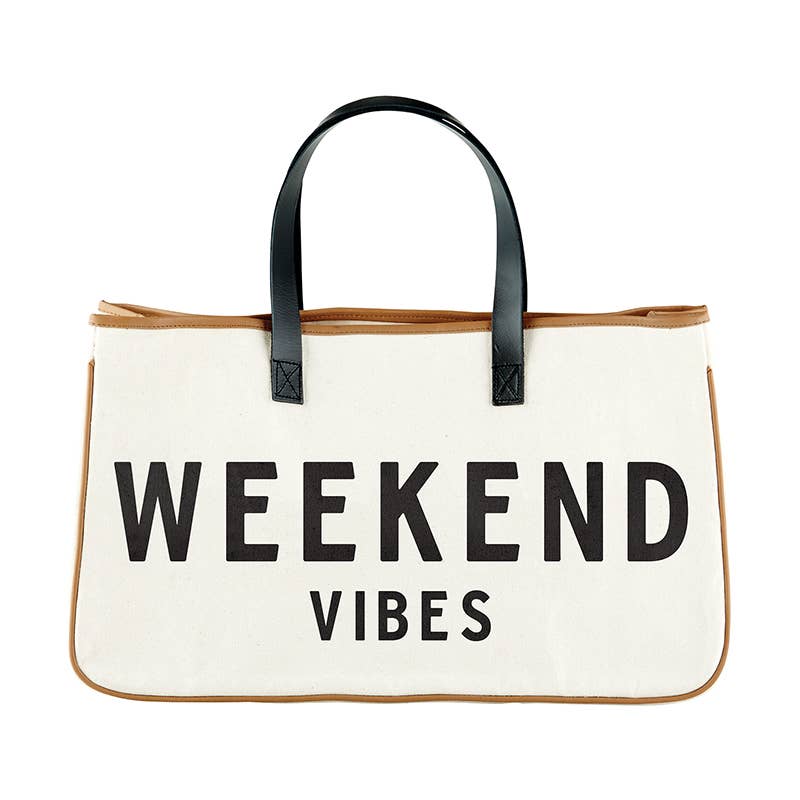 a white and black tote bag with the words weekend vibes printed on it