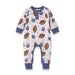 a baby sleepsuit with a football pattern on it