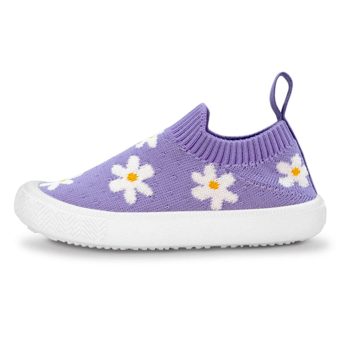 a purple shoe with white flowers on it