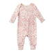 a baby girl's pink and white floral footie