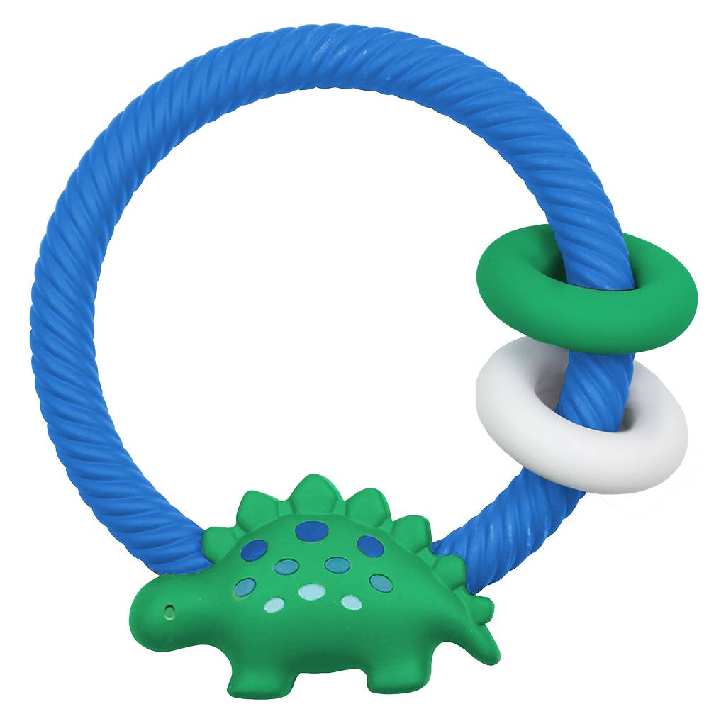 a green and blue teether toy with a white ring and dinosaur on it