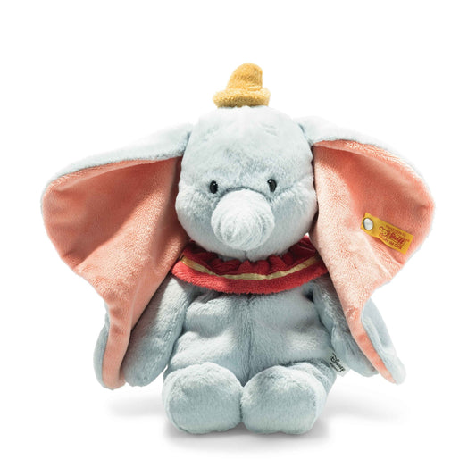 a small stuffed elephant with a gold crown on its head