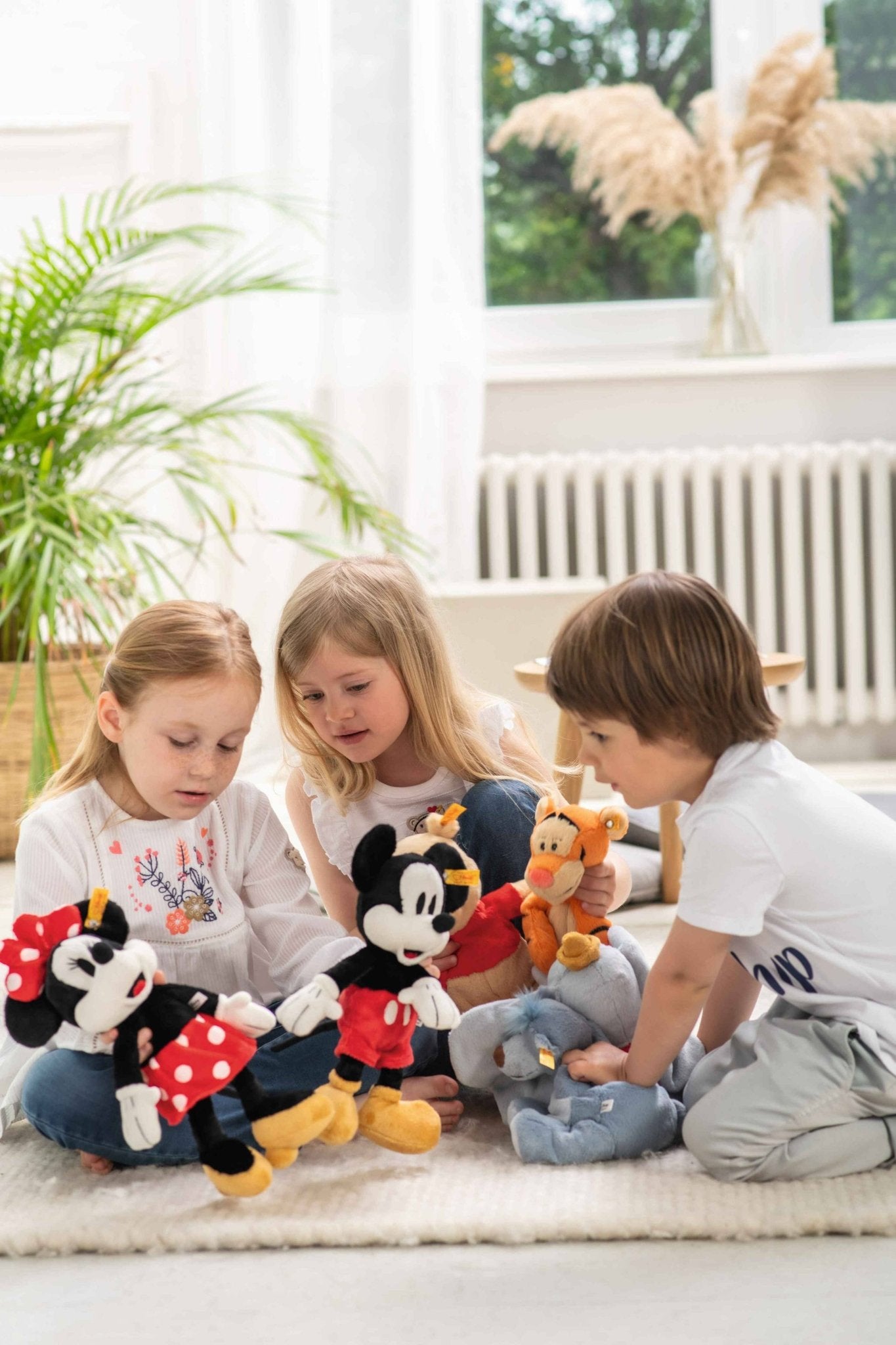 kids playing with Disney's Mickey Mouse Stuffed Plush Toy, 12 Inches