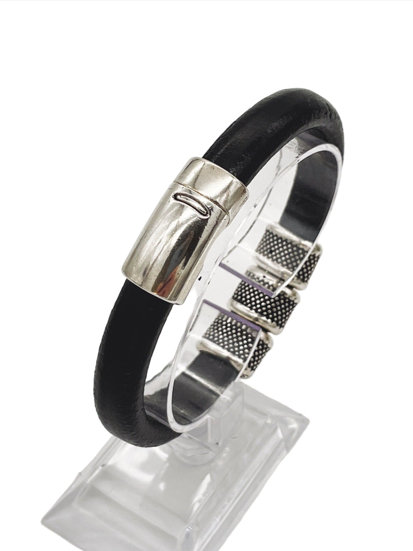 a black leather bracelet with a silver clasp