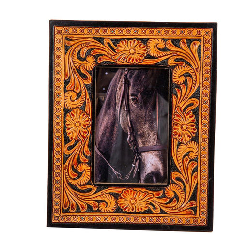 Hand tooled picture frame.