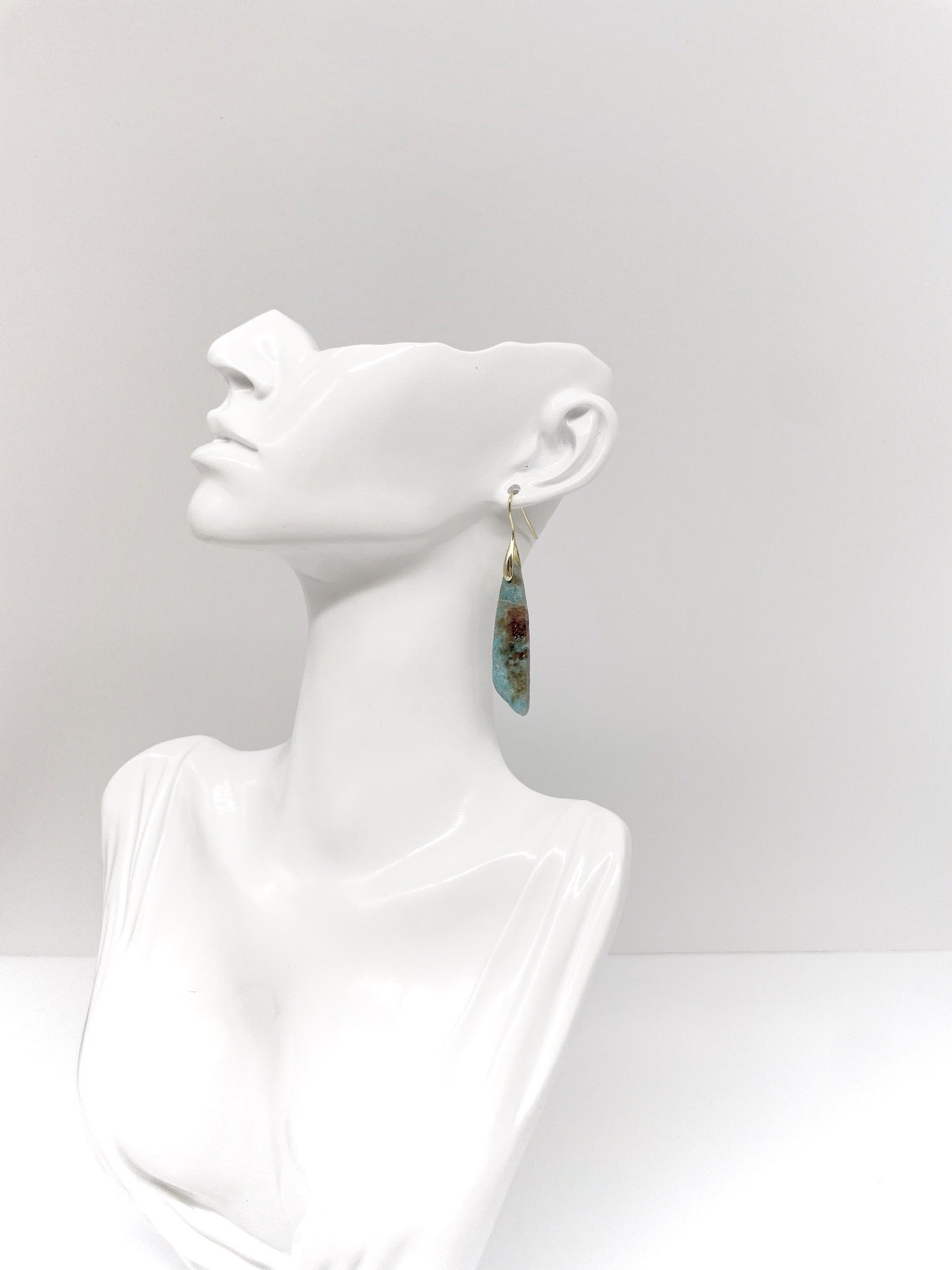 mannequin wearing earring