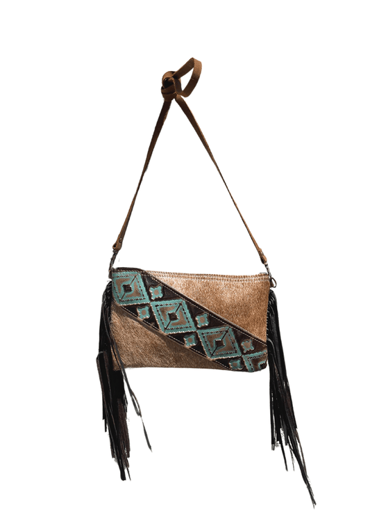 a brown purse with fringes hanging from it