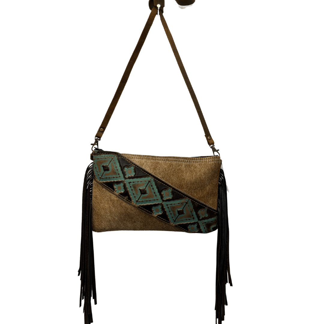 a brown and black purse hanging from a hook