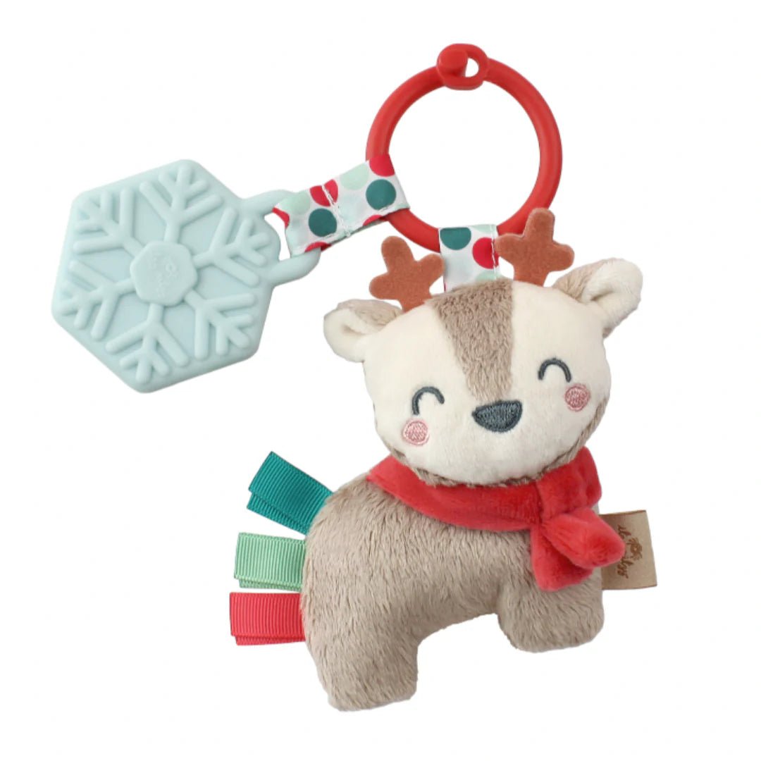 a stuffed animal keychain with a tag attached to it