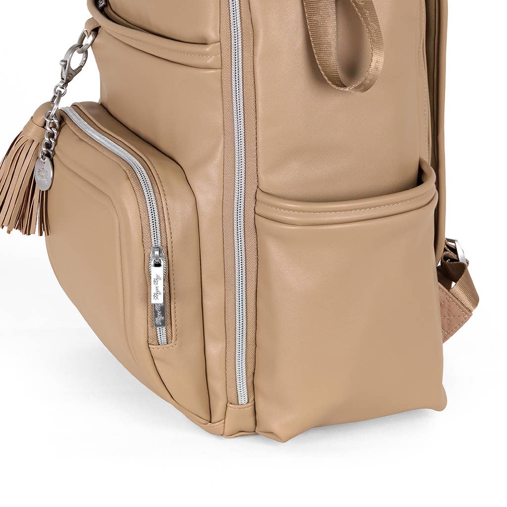 a tan leather backpack with a tassel