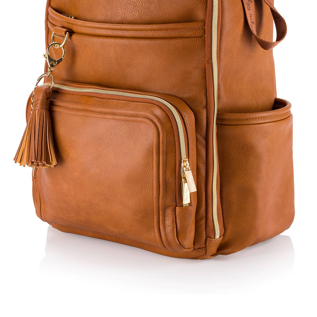 a brown leather backpack with a tassel