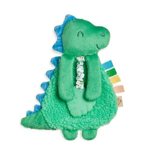 a green stuffed animal with a blue tail