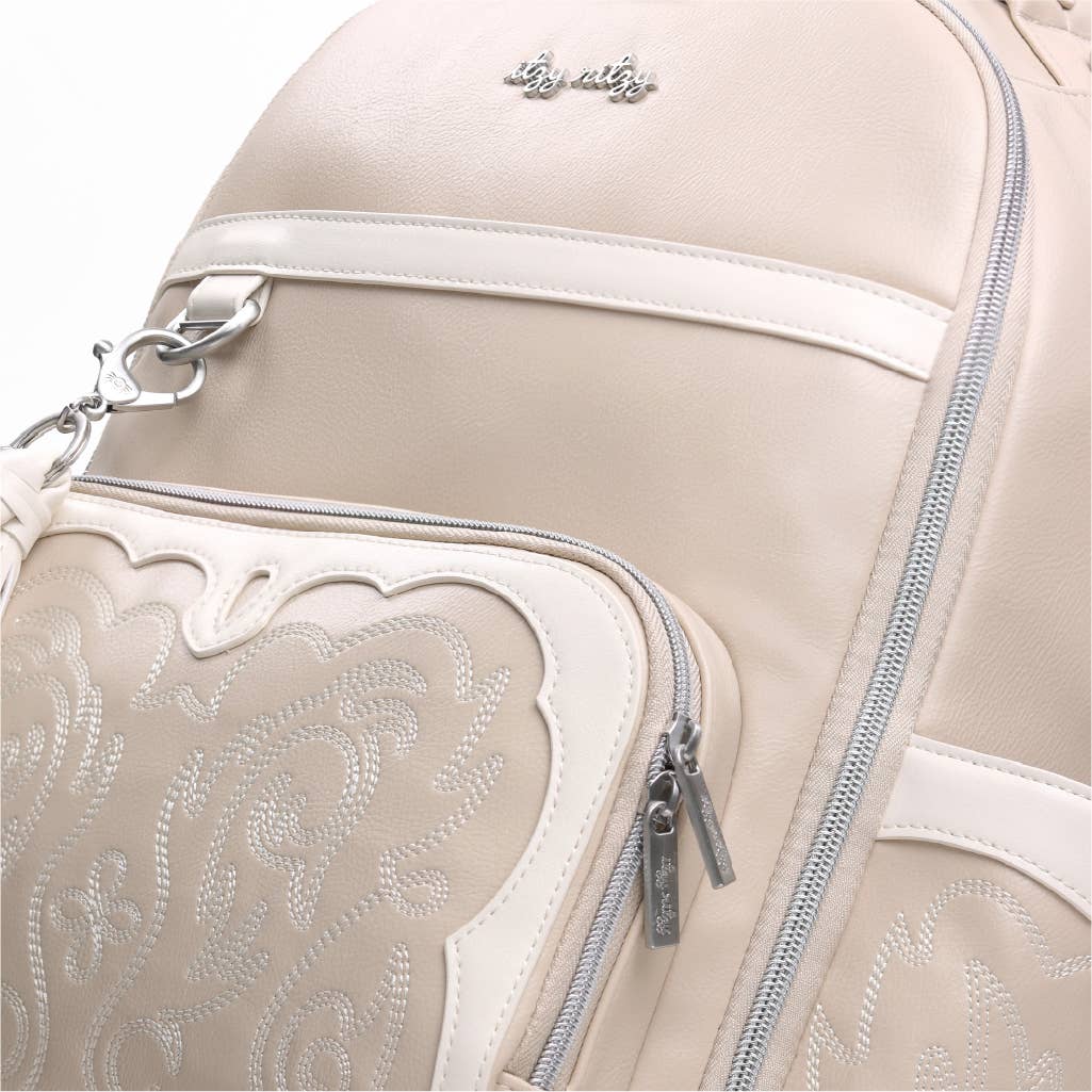 a close up of a white backpack with a zipper