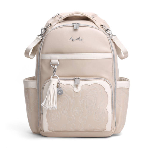 a white backpack with a tassel on the front