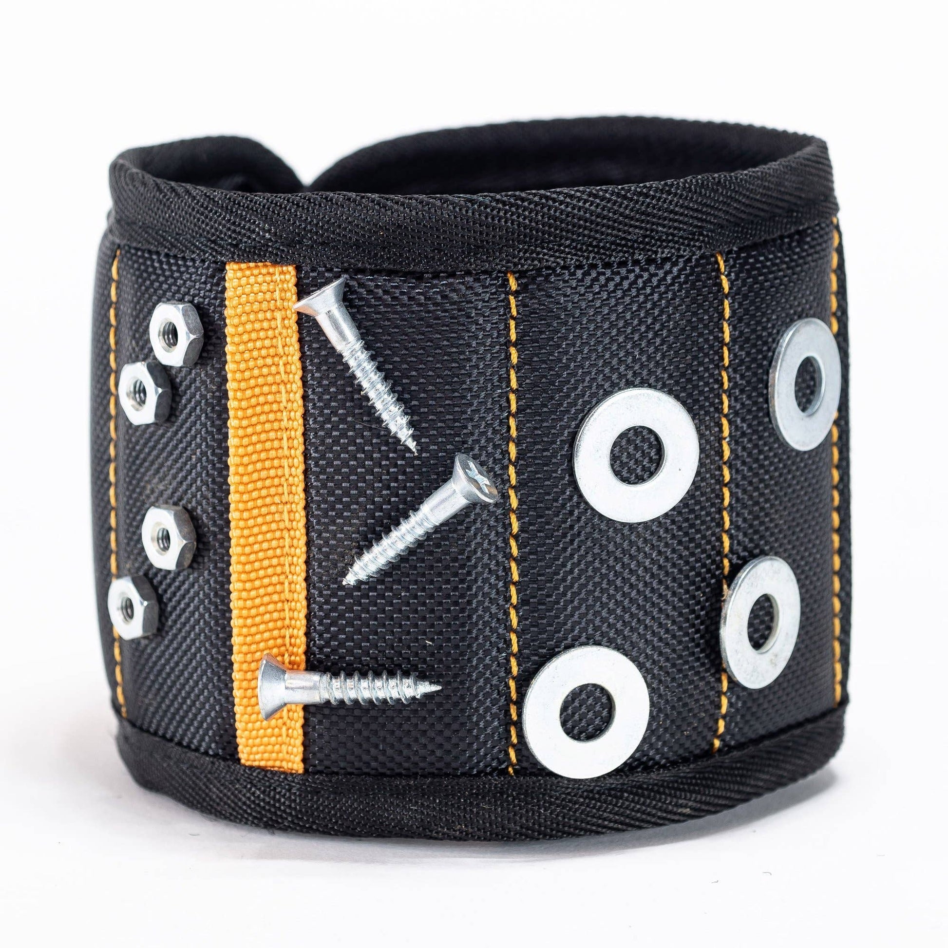 a close up of a magnetic wristband cuff with screws and washers on it