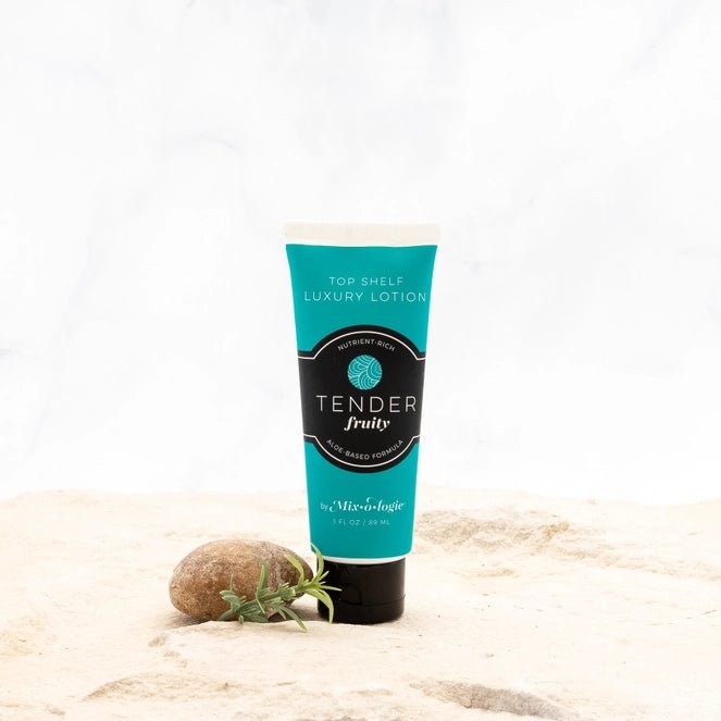 Luxury Lotion in a tube on sand