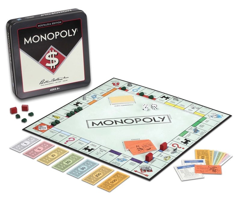 a monopoly board game in a tin case