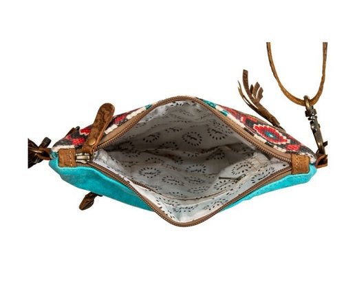 a small purse with a deer head on it