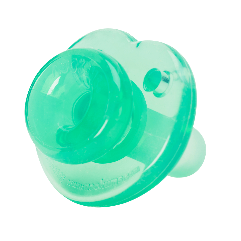 a close up of a baby pacifier on a white background