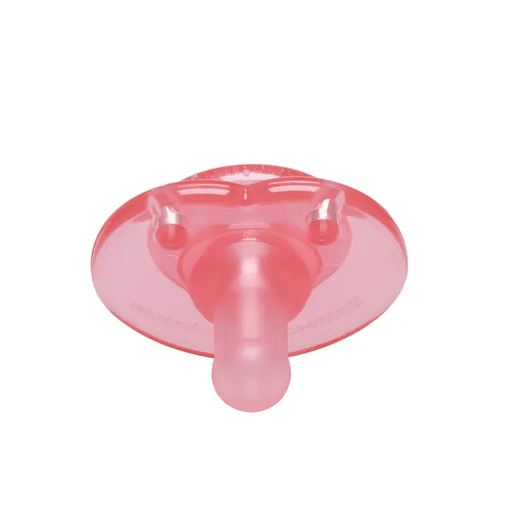 a pink plastic object on a white background