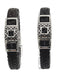 a pair of black leather bracelets with silver accents