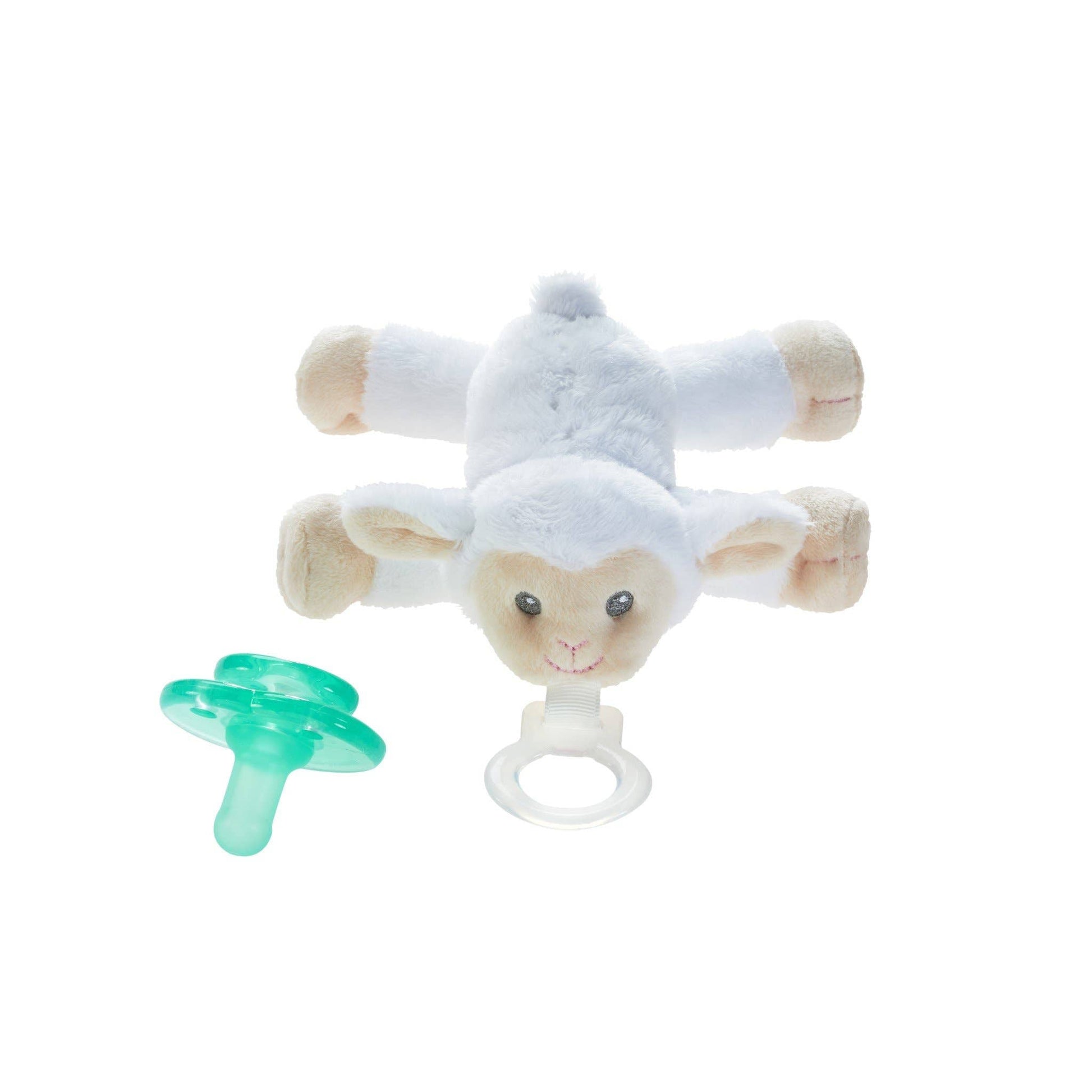 a stuffed animal with a pacifier attached to it