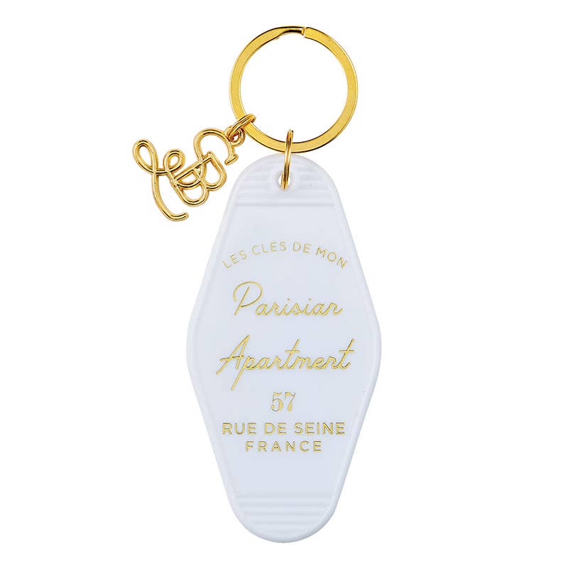 a keychain with the words paris apartment on it